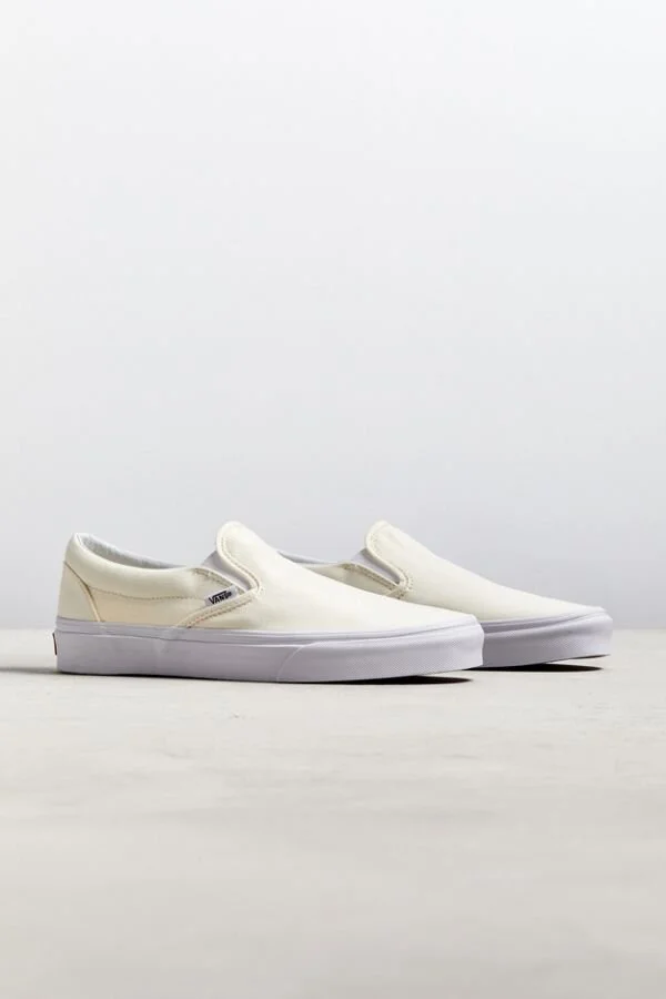 The Vans Classic Slip-On Sneaker in "Ivory" Is On Sale For 50% Off!
