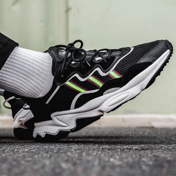 The "Black/Solar Green" adidas Ozweego Is On Sale For $56.10!