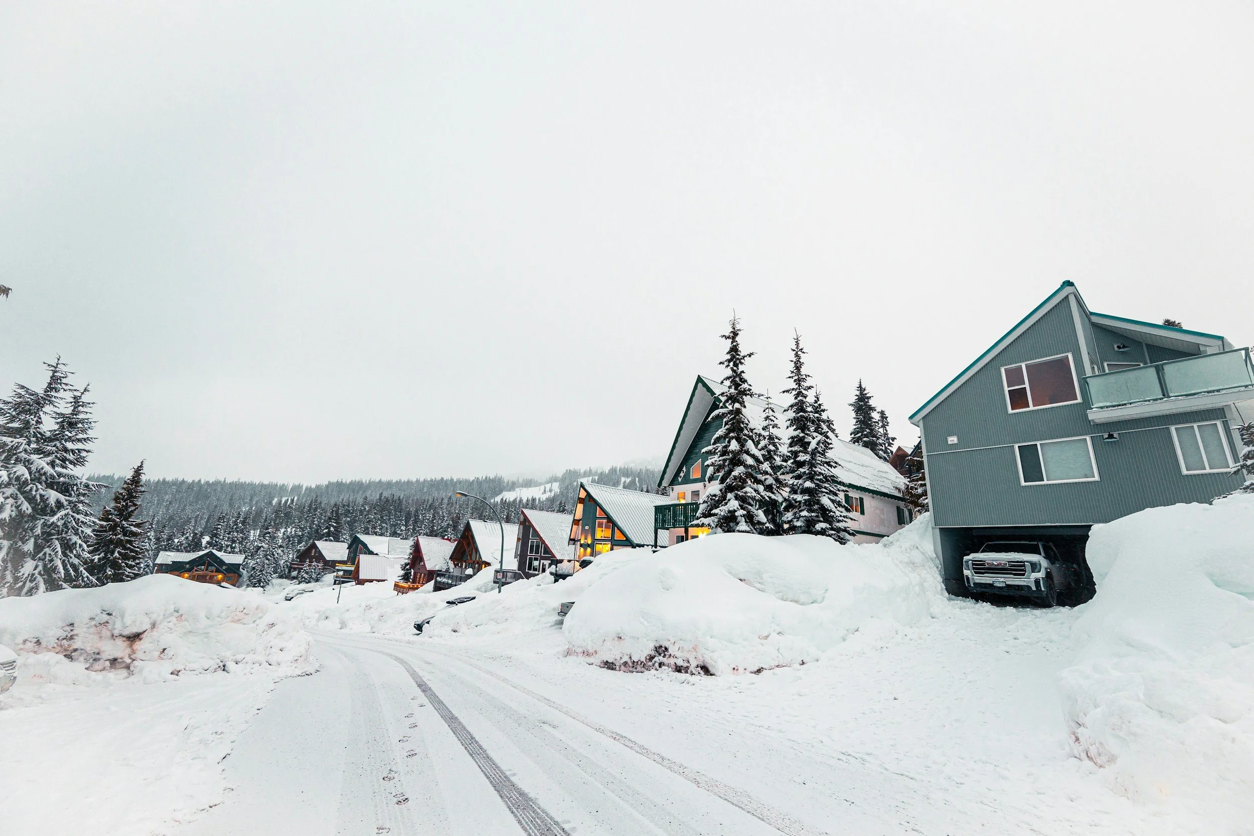 Snow-covered residential community highlighting the need for coordinated corporate lodging strategies delivered by Lima Charlie Inc. during severe winter disruptions.