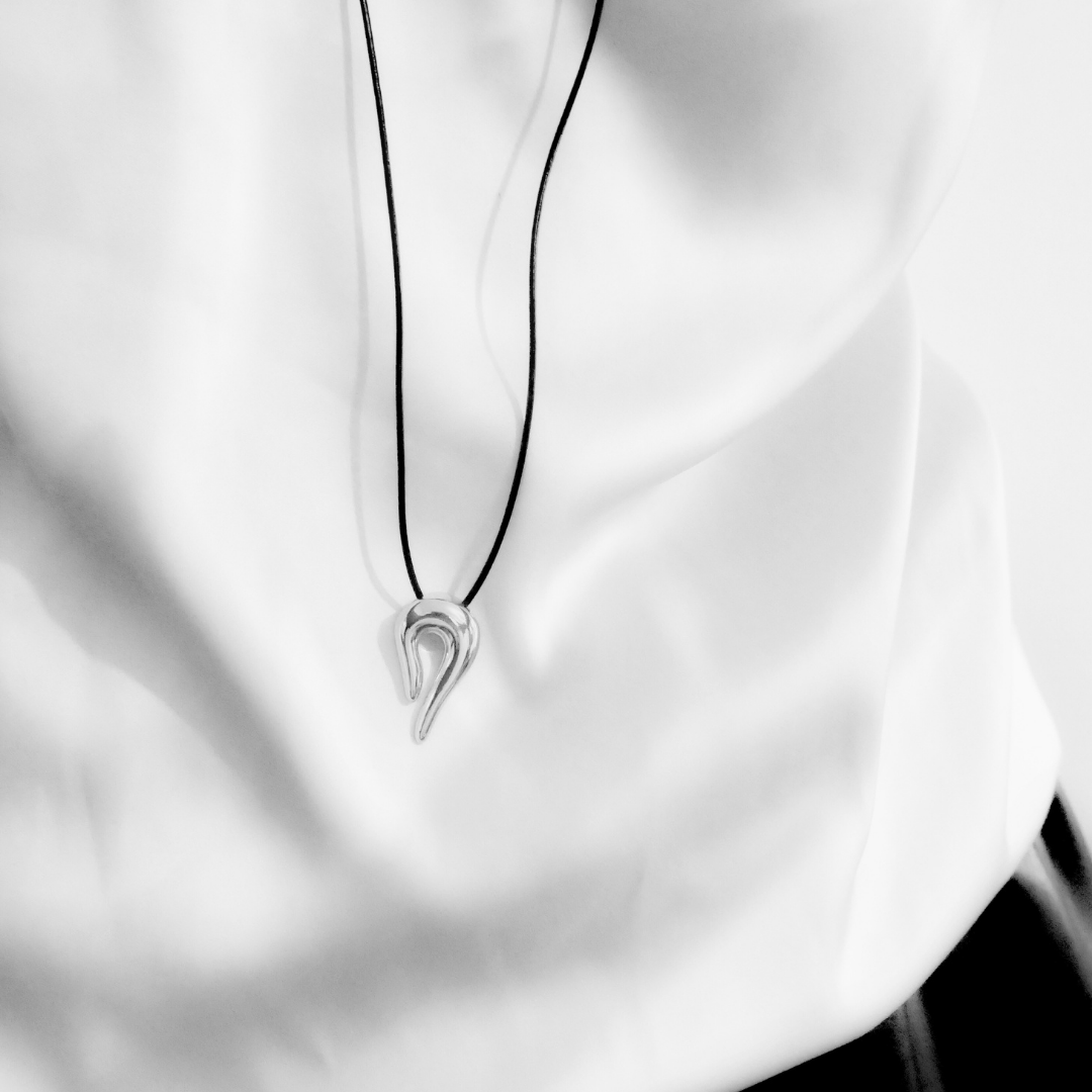 The Aureum Necklace On Model (3).png