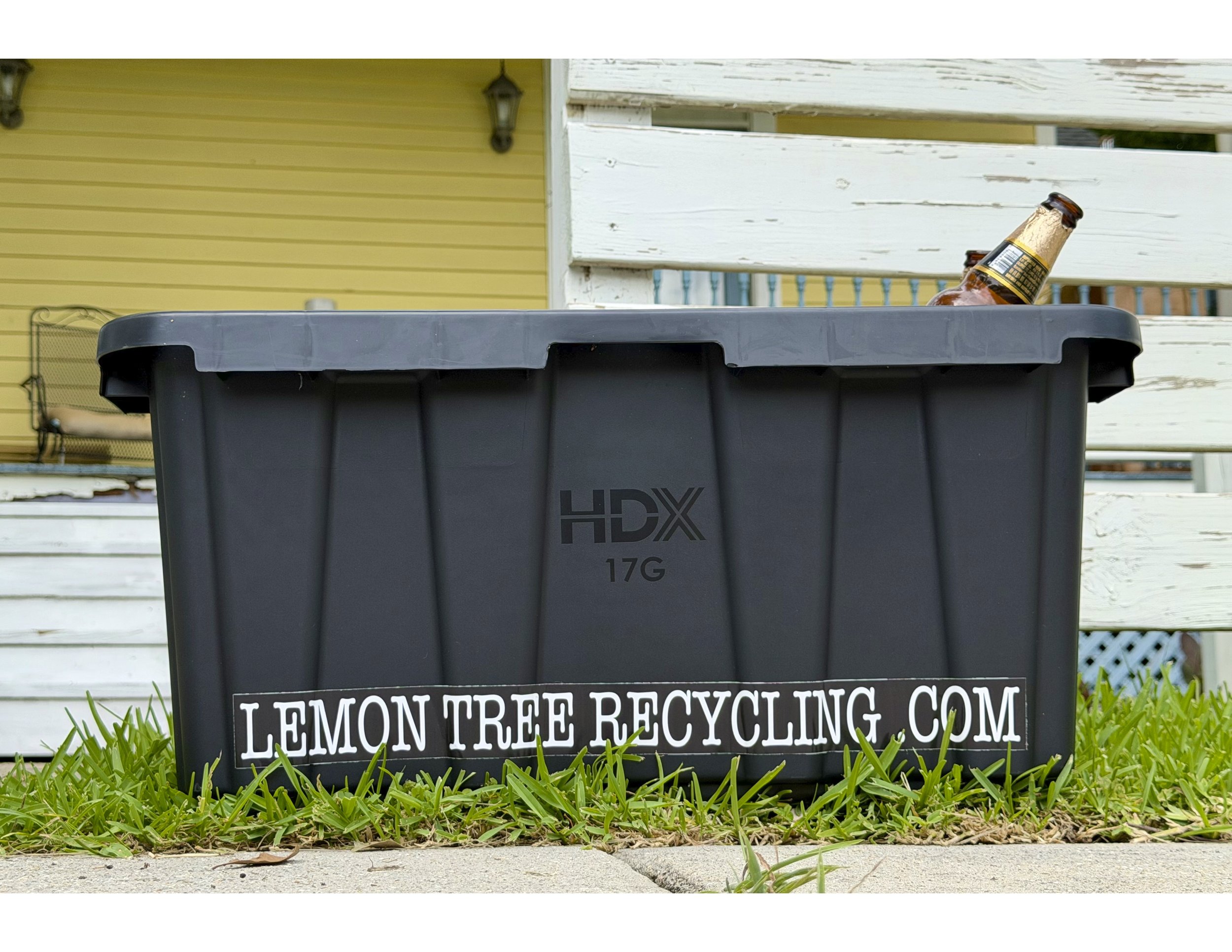 black bin w: glass poking out.jpg