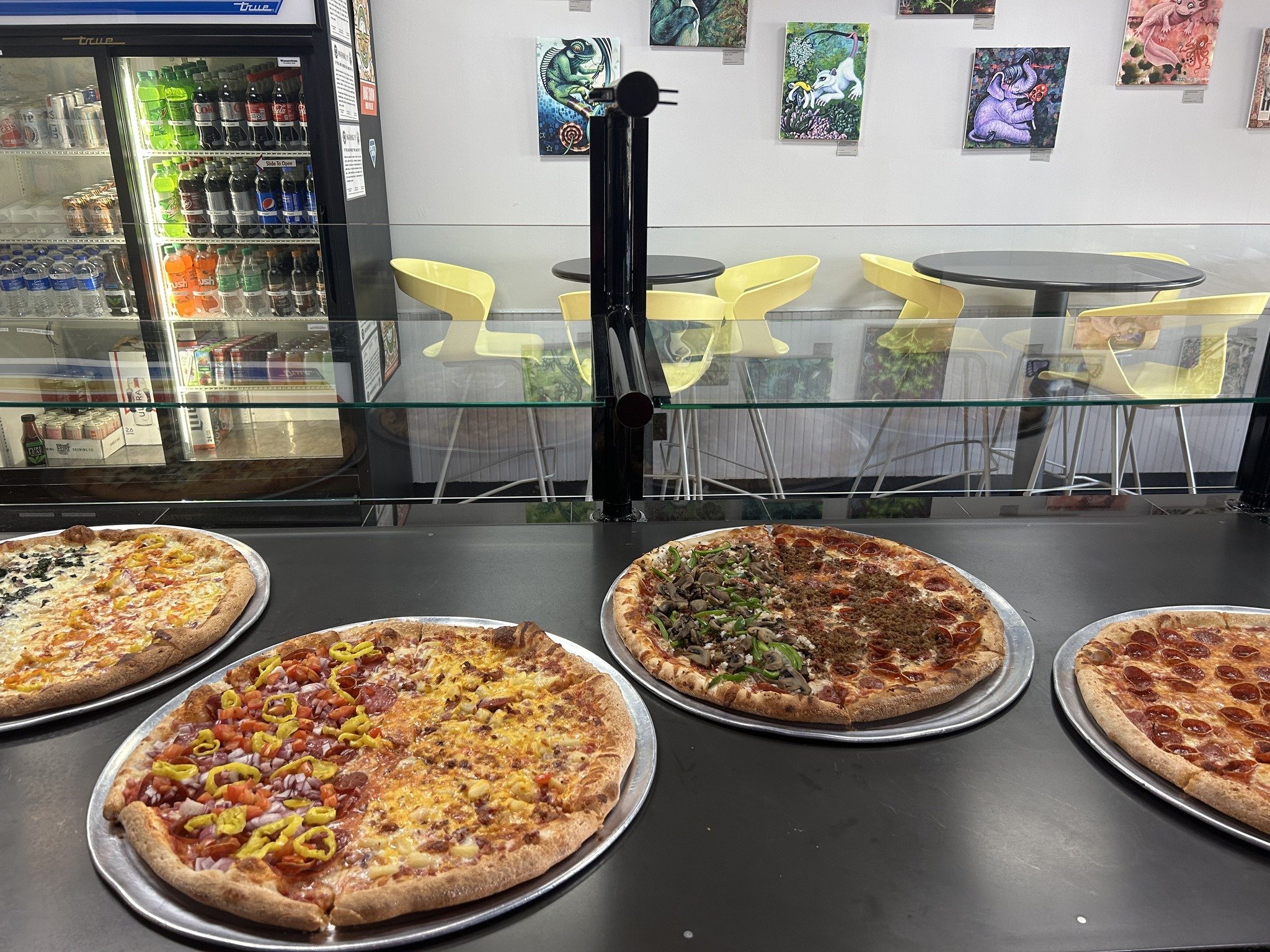 🍕It's Pizza Friday!!! Who's hungry for lunch?🎉🍕
 
If you didn't already know, we offer Pizza-By-The-Slice during weekday lunch hours (11am-2pm Tuesday-Friday). We cut our 18&rdquo; Specialty Pizzas into 6 HUGE slices - 1 slice for $6, or 2 for $10