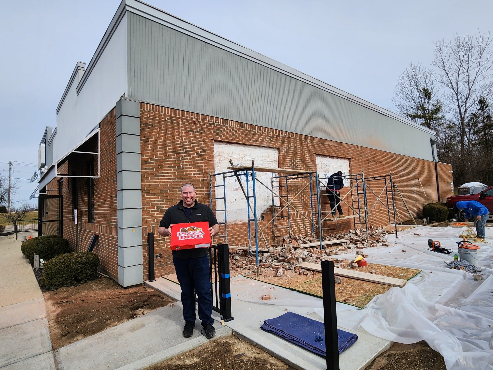 Lunch at the new place? Don&rsquo;t mind if we do. 🍕👷&zwj;♂️

Okay&hellip; not officially open yet. But that didn&rsquo;t stop Michael from bringing Pizza Dive pizza from our current location and claiming a corner of Towne Drive for lunch.

And lis