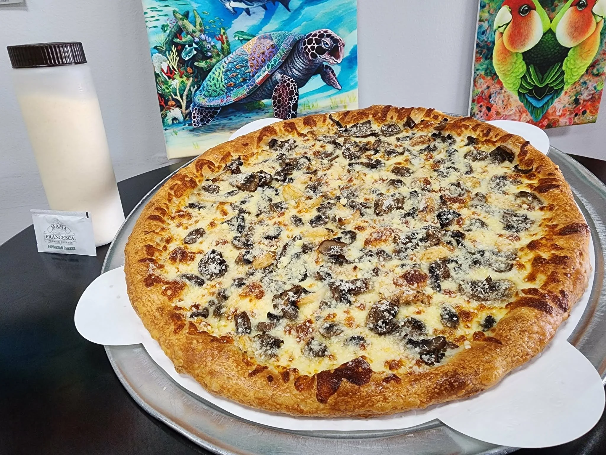 🍄 Showing some Mucho Mushroom love today!

One of our favorites &mdash; and a proud member of the All Day Pizza-By-The-Slice lineup. 🍕

Olive oil base. Mozzarella blanket. Fresh + traditional mushrooms. Roasted garlic. Parmesan blizzard after the b