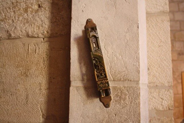 A mezuzah on a doorframe in Jerusalem.