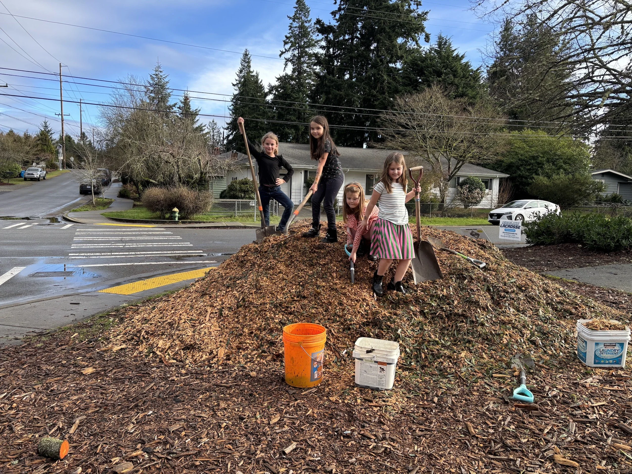girls on chip pile.jpg
