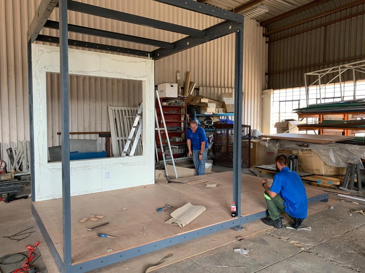    Built in a factory, so not exposed to the elements.     Each stage of building can be quality controlled before next is started.     Better working conditions.     Underneath the exterior is an aluminium superstructure that has incredible strength