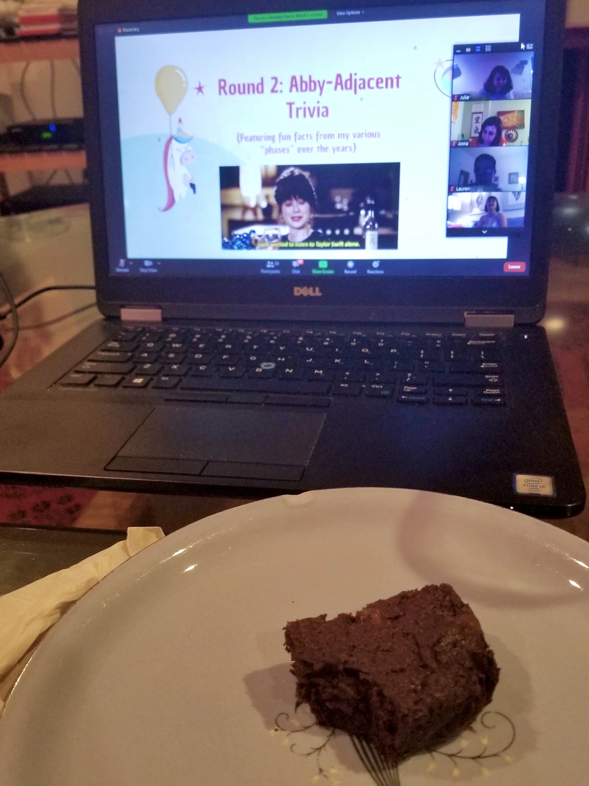 Julia snacks on a brownie while gearing up for the second round of trivia.