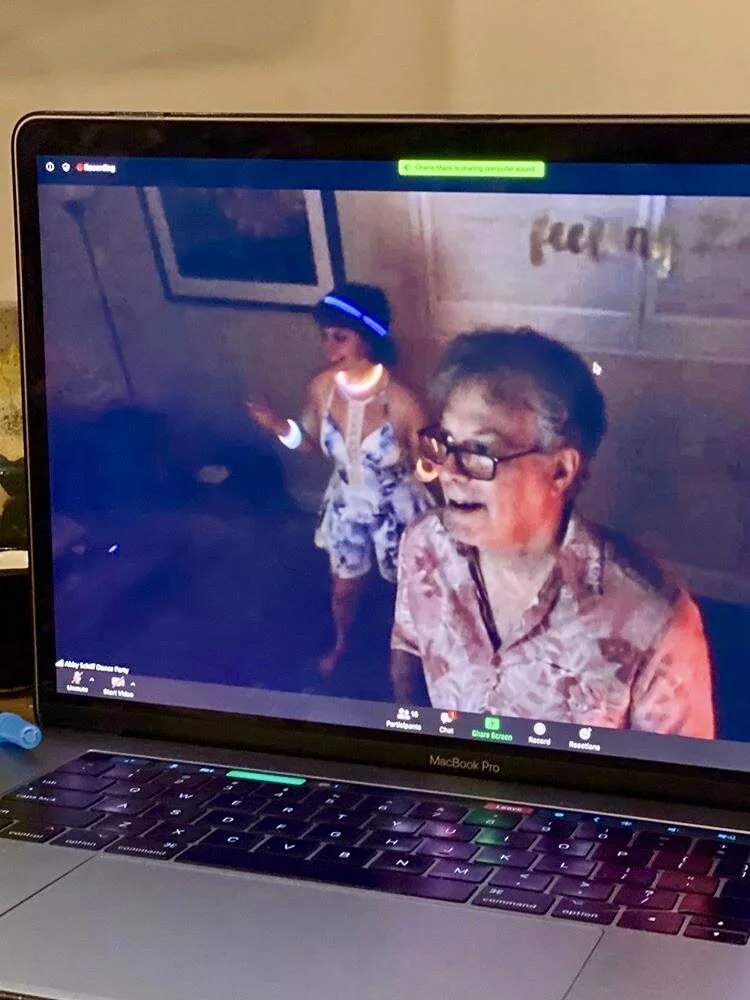My ever-geeky father helping me get set up for the dance party.