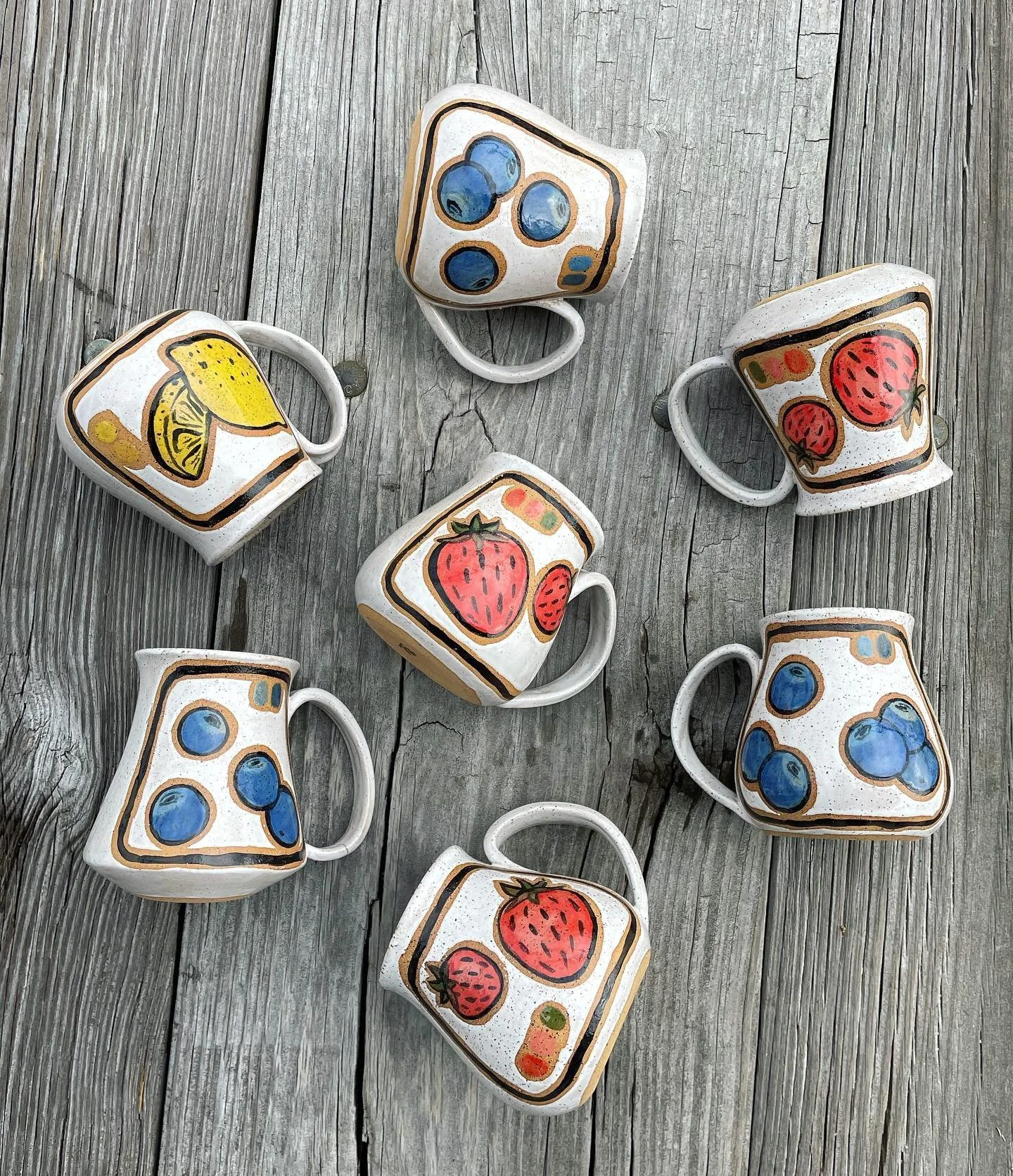 One more day until our shop update! 🤩 Our website will be updated at 10am EST - don&rsquo;t forget to set a reminder!

This is our first batch of mugs with the new fruit design, what do you think? 🍓🫐🍋