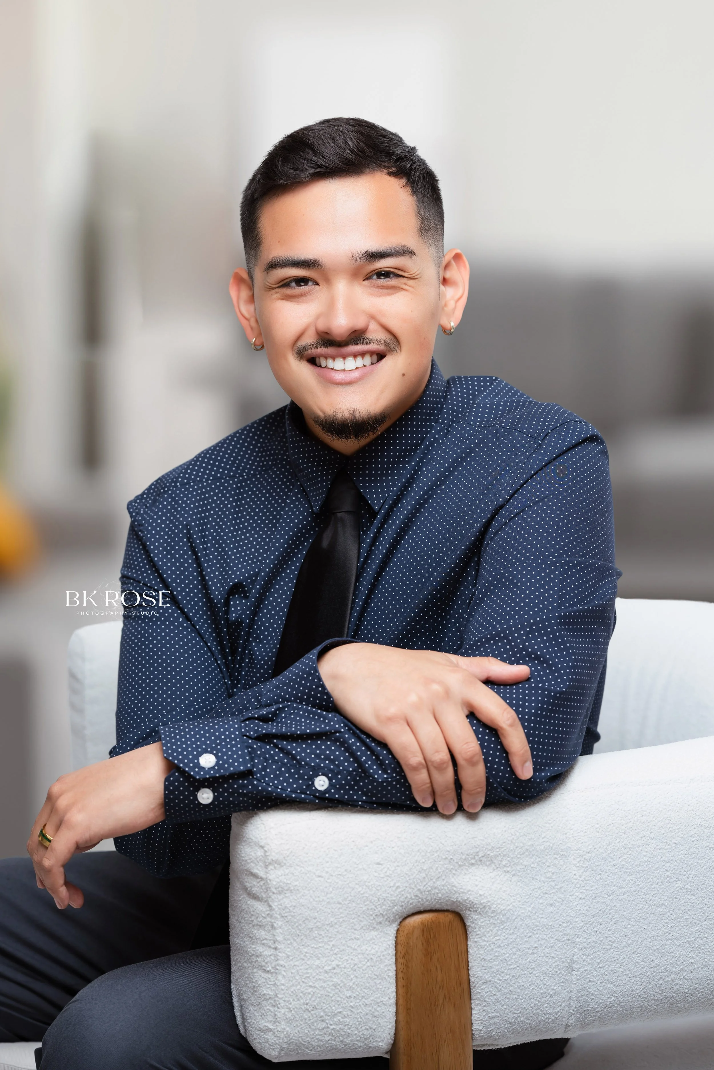 Man sitting on chair smiling