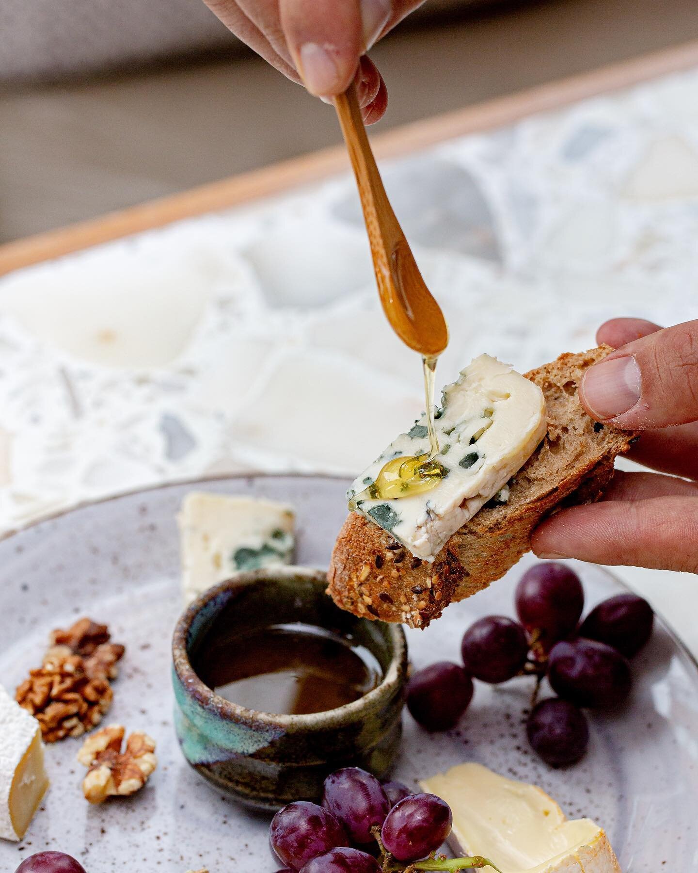 Honey and cheese, a marriage made in heaven 🍯🧀
 Order now your cheese platter and a couple of drinks via the link in our bio