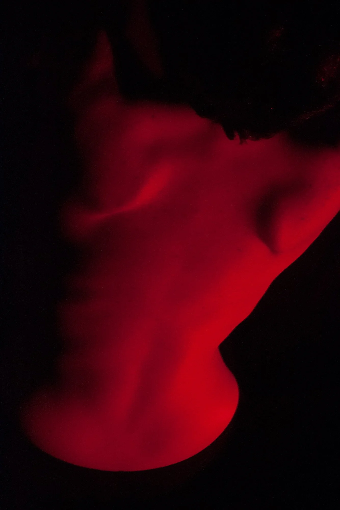 Sculptural photograph of a female torso illuminated with directional light from the series MISShapes by Beatriz Perez. 