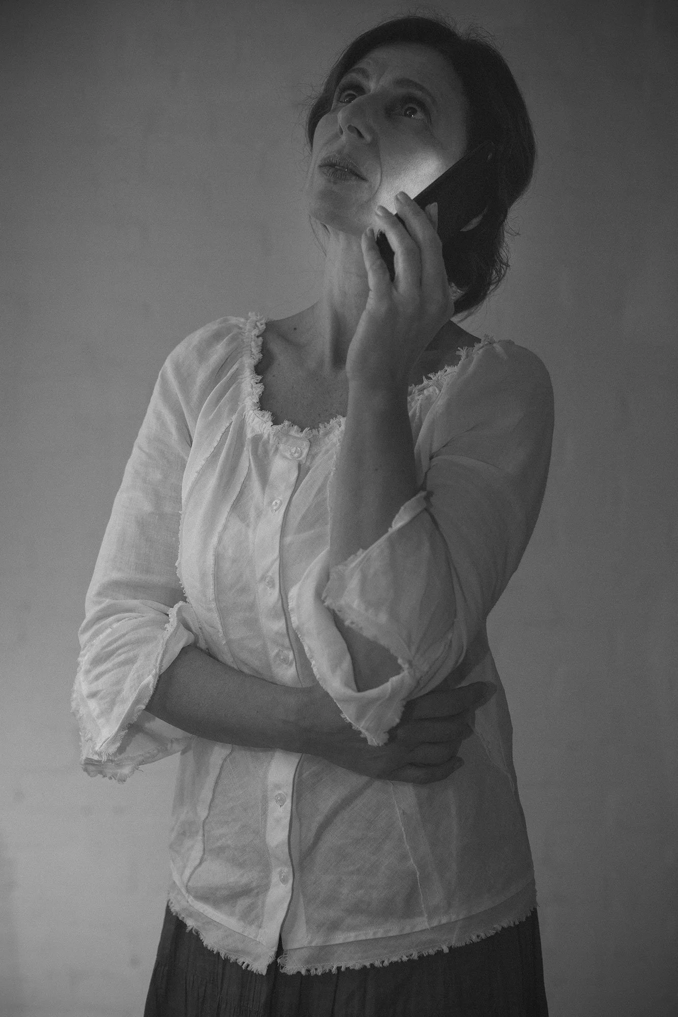 Portrait of a woman speaking on a mobile phone from The Weeping Woman series by Beatriz Perez.
