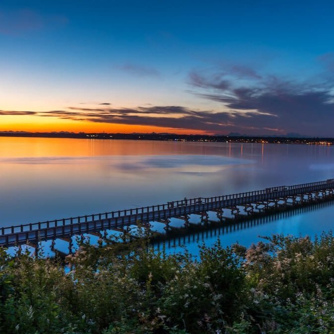 The bourdwalk and Bellingham Bay at sunset