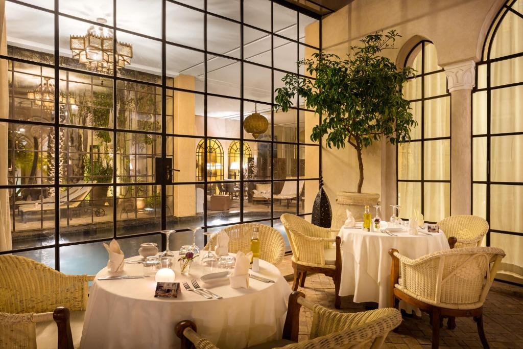 Palais Khum dining and pool.jpeg