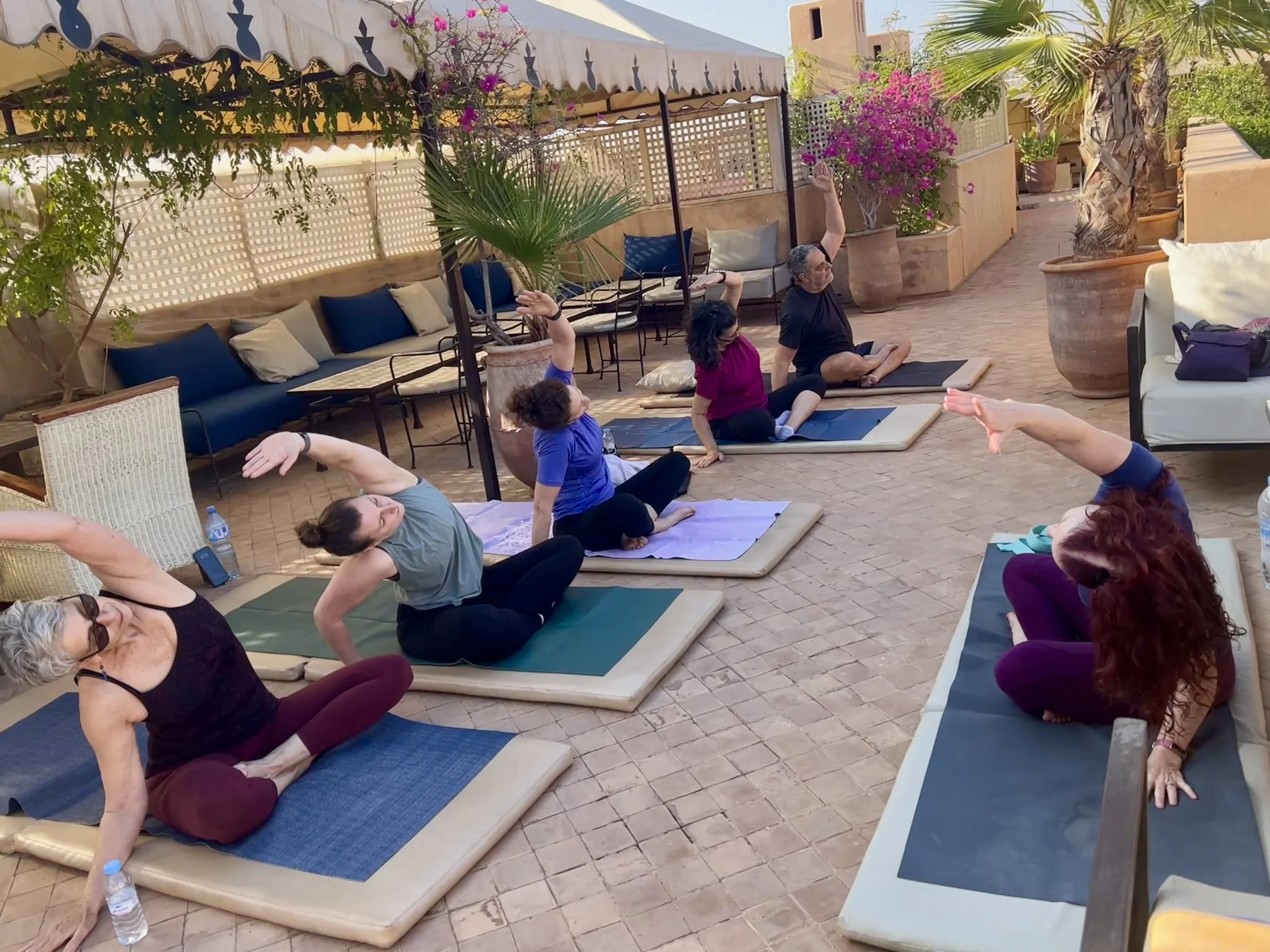 Rooftop yoga on wellness retreat in Marrakech.JPG