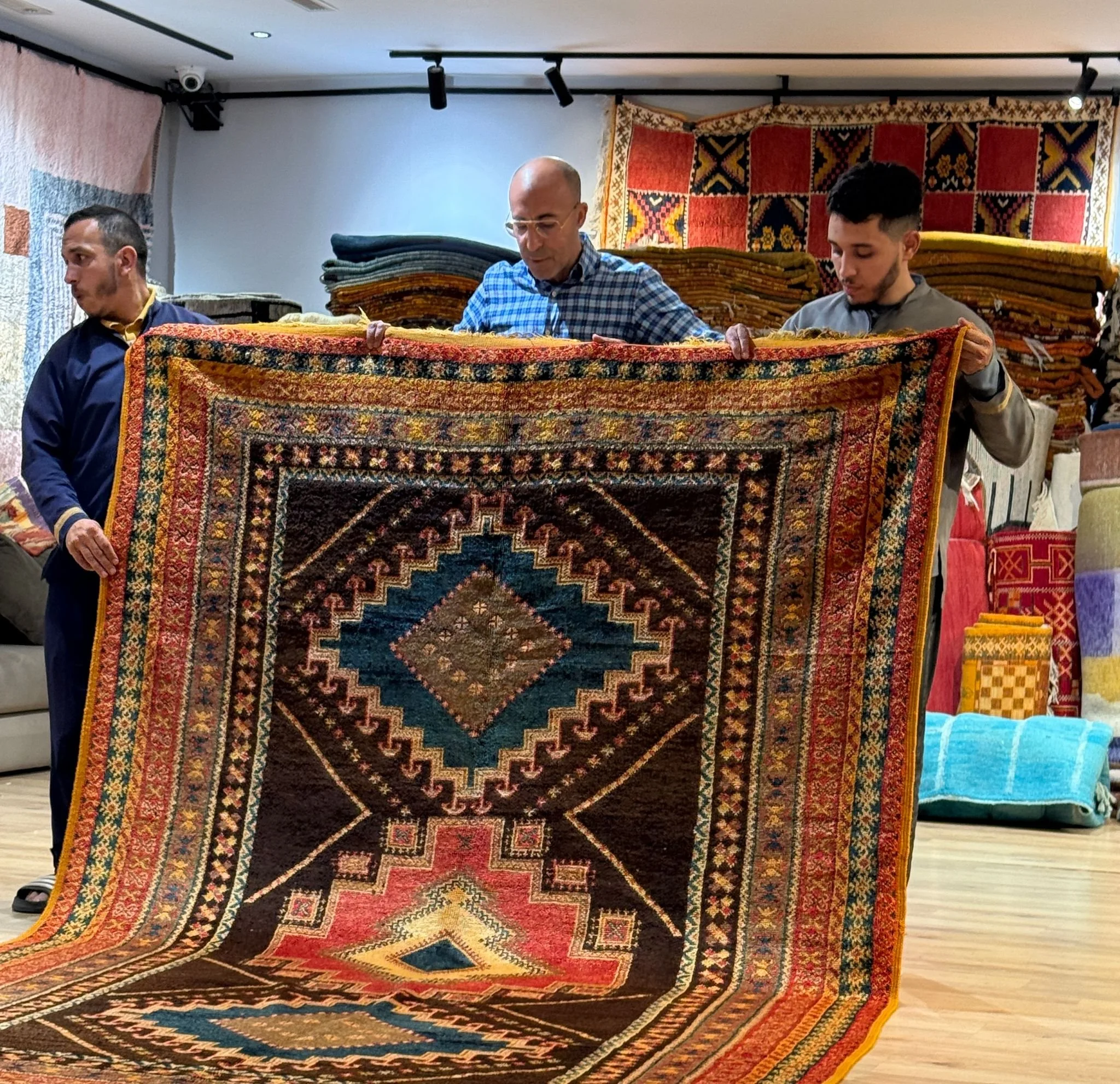 Rug demonstration artisan retreat in Morocco.jpg