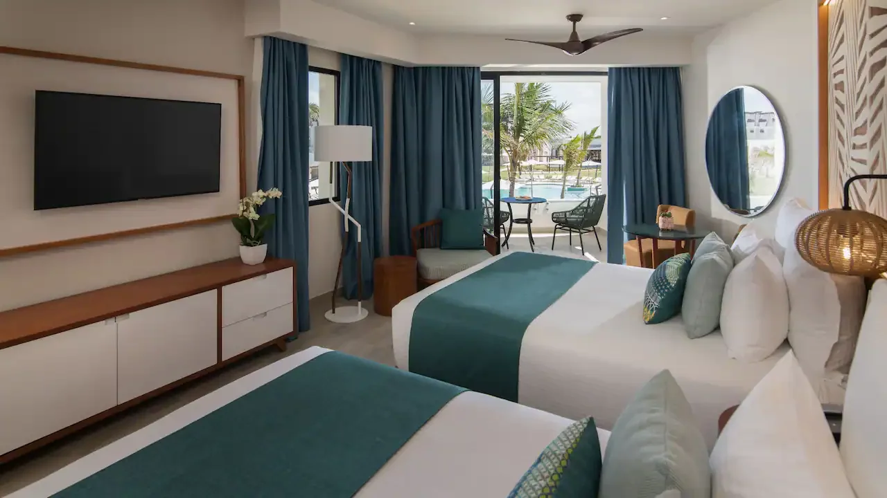 DRMPC-P0006-Junior-Suite-Pool-View-Queen-Beds.16x9.webp (Copy) (Copy)