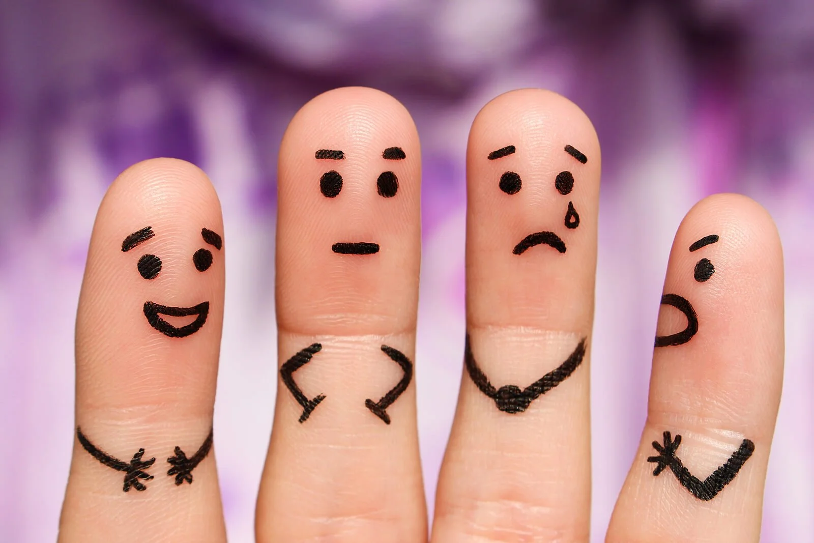 fingers with different facial expressions representing emotional “parts” within a person. This visual reflects parts work in St Paul, MN, a key concept in internal family systems therapy in St Paul, MN