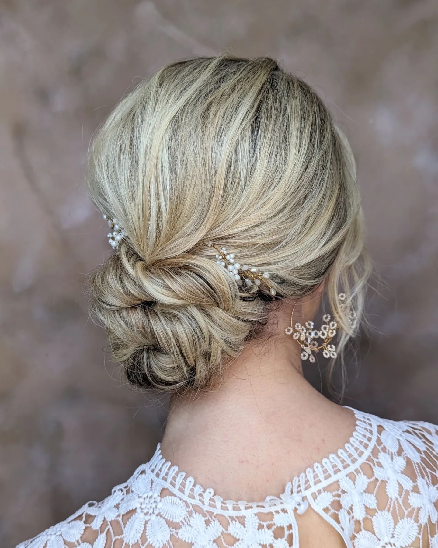 Feeling lost in a sea of bridal updo options? Don't worry, I'm here to help!

Here are my 3 top tips to help you choose the perfect wedding updo for your big day:

1. Your hair type - your hair type plays a big role in finding the right updo for you.