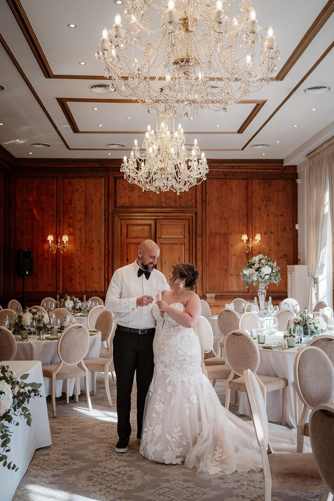 a bride and groom embrace at Hedsor House wedding venue