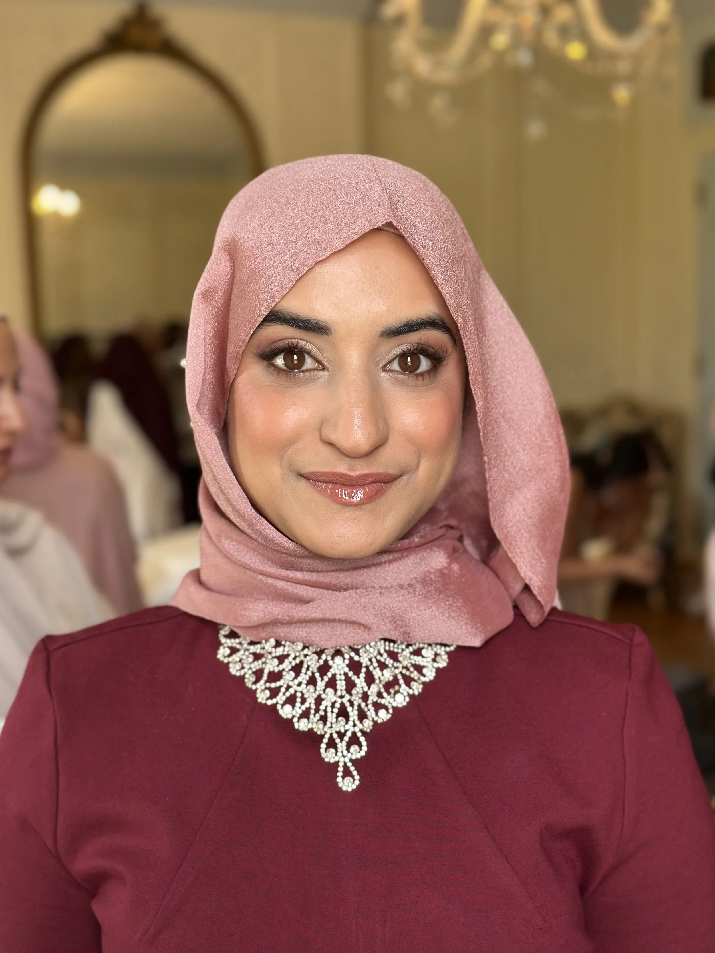 A bride on her wedding morning, wearing naturally enhancing soft glam makeup