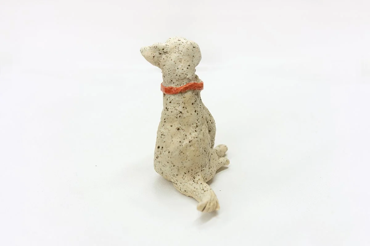 Dog with Bone Collar, From Behind | 
4.75”H x 3"W x 5.5”D |
White Stoneware with Glaze | 2026