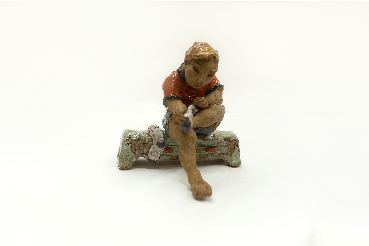 Mudroom Bench, Putting on Socks, Head on | 
5.5”H x 5.5"W x 5.52”D |
Brown Stoneware with Glaze | 2026