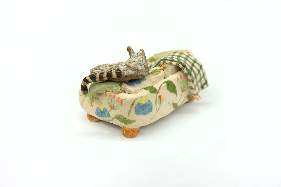 Couch with Cat | From behind |
3”H x 7"W x 4”D |
White Stoneware with Glaze | 2026
