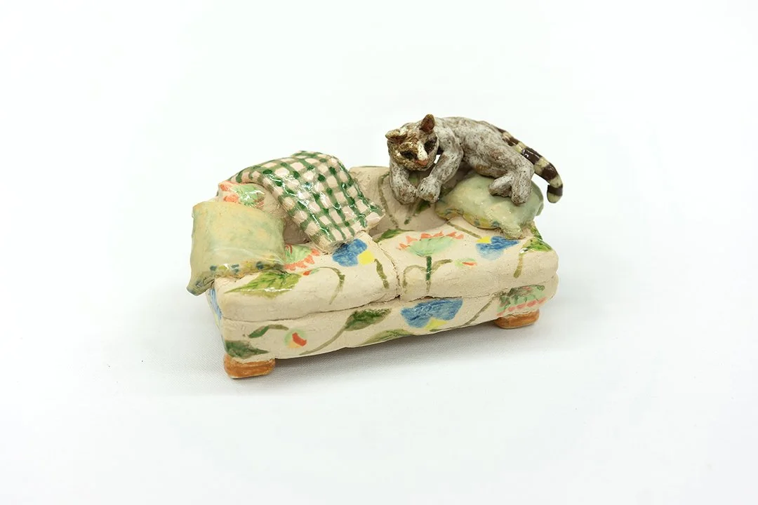 Couch with Cat | Head on |
3”H x 7"W x 4”D |
White Stoneware with Glaze | 2026