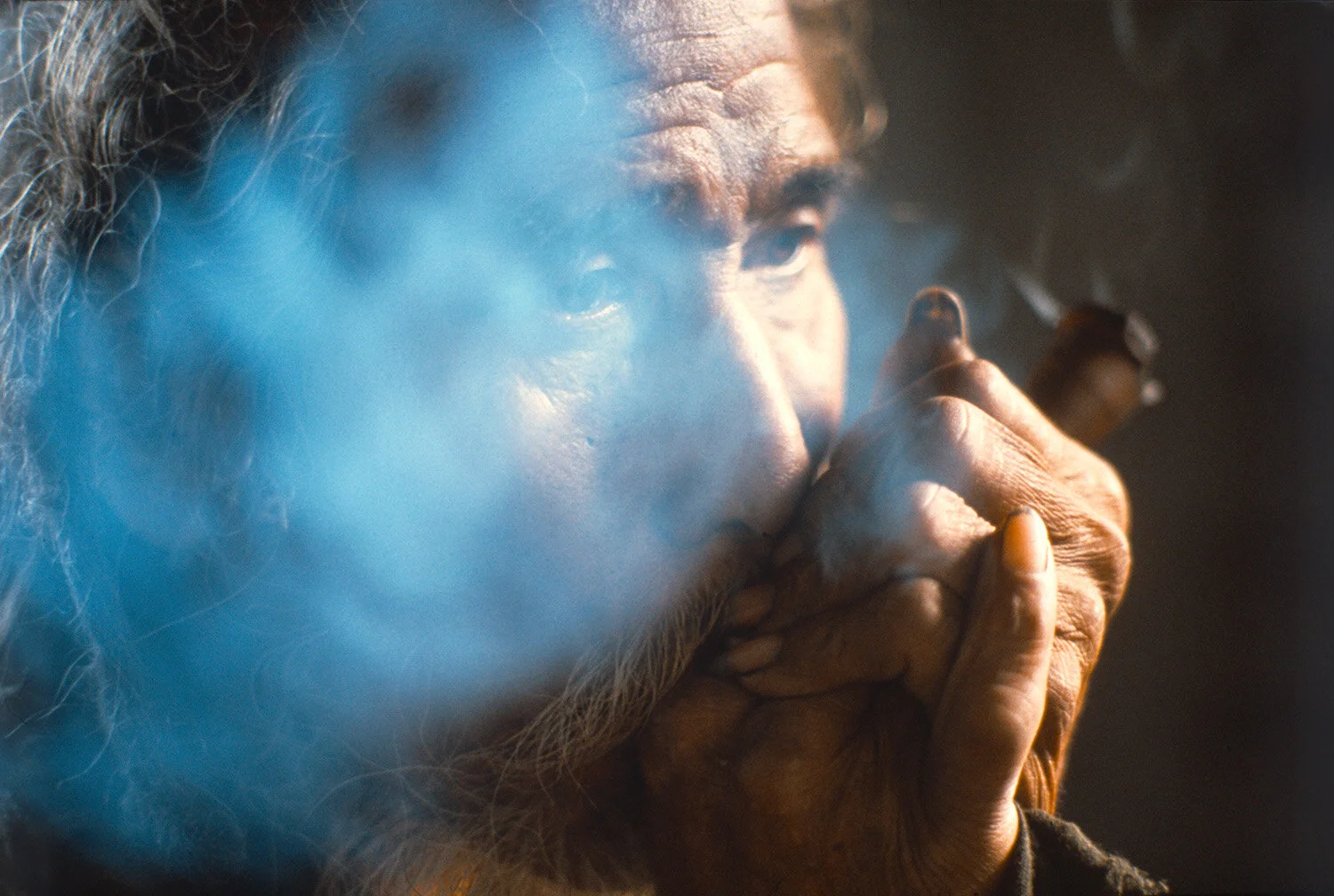  Holy Man smoking in Kathmandu, Nepal. 