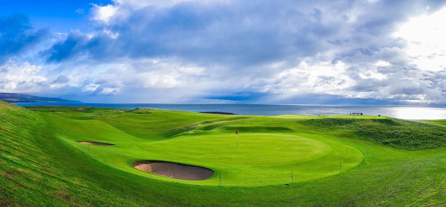  Panorama of 18th Green at Brora Golf Club along Moray Firth in Brora, Scotland.  