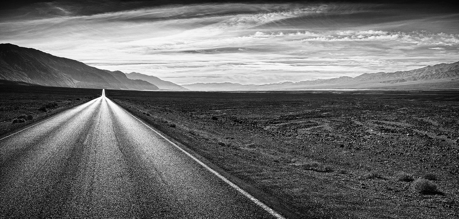  Black&White panorama of road to Badwater in Death Valley National Park in California. 