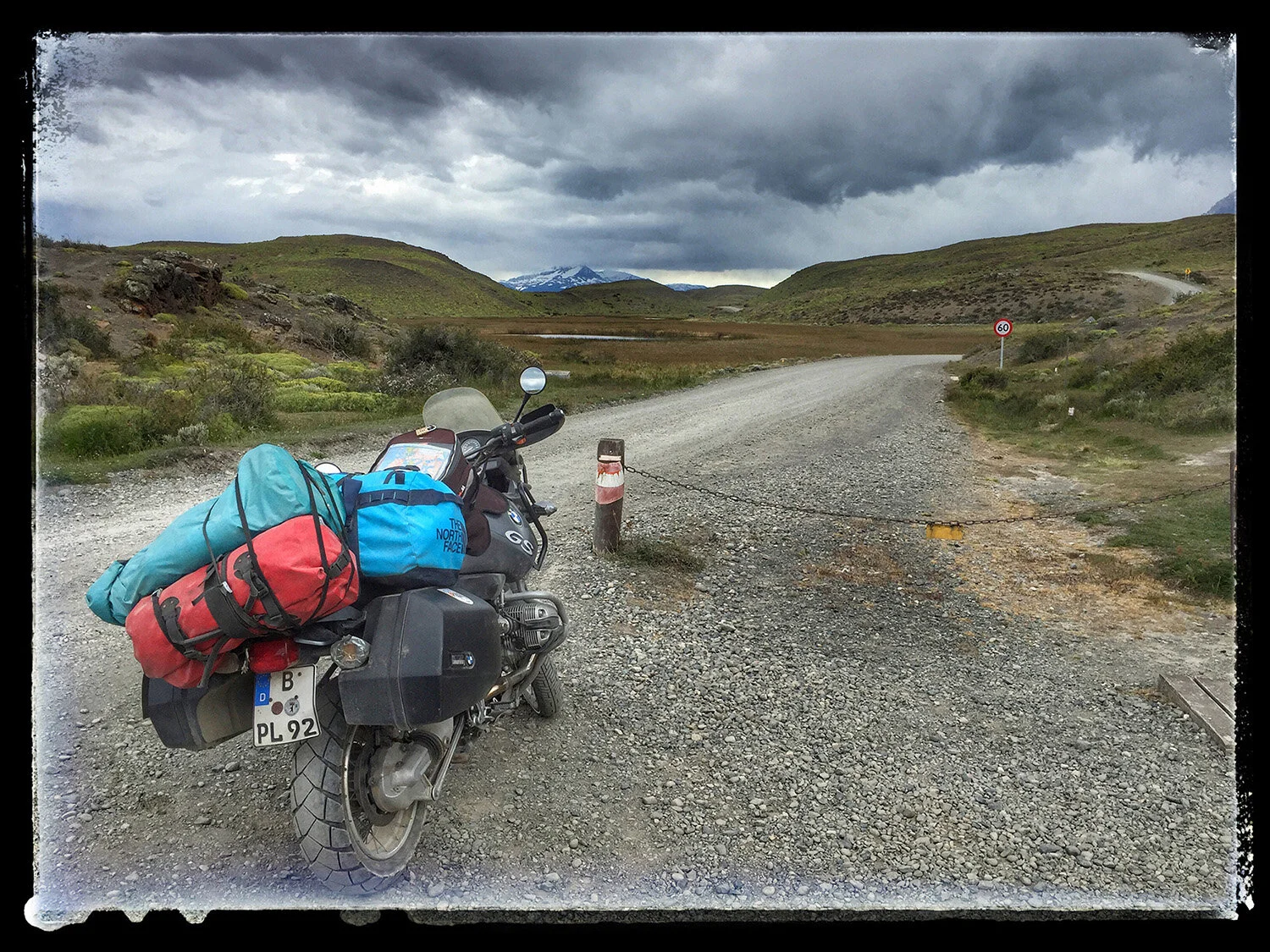  Parked motorcycle as rider registers to camp in Torre del Paine NP, in Patagonian Chile.  Blonde rider from Berlin was a Joni Mitchell lookalike and when I told her it was the Only way to see Patagonia, she stared at me in disbelief, perhaps knowing