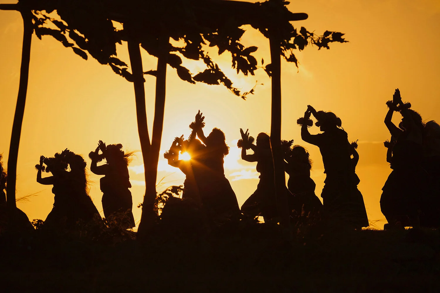 Sunrise Hula performance directed by Kumu Keala Ching at Ka’ana, Mauna Loa on Moloka’i, legendary site of Laka, goddess of hula. Mural print in collection at Mayo Clinic, Rochester, MN in memory of Julia A. Rosekrans, MD who is silhouetted in dance.