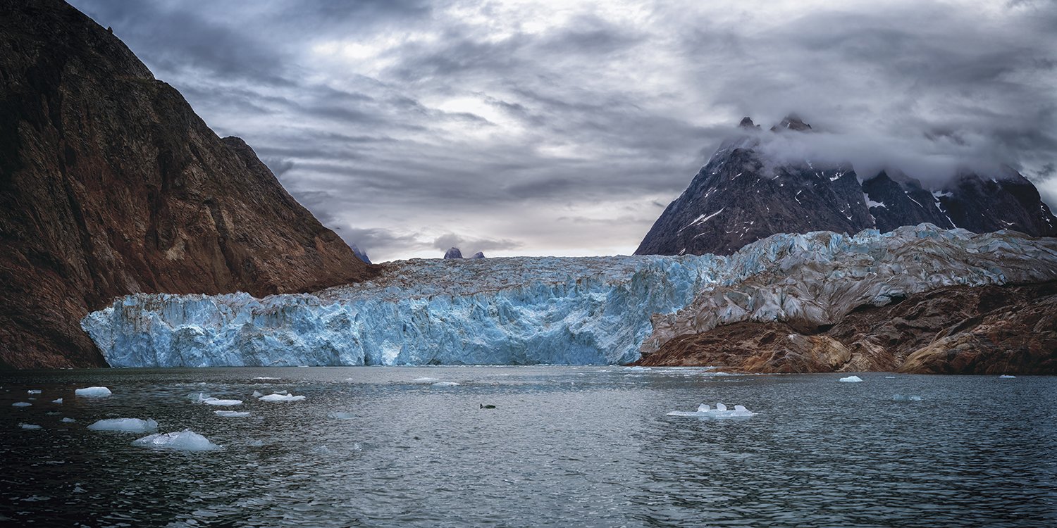Cloudy panorama of Evigheds Glacier in Evighedsfjord, Greenland