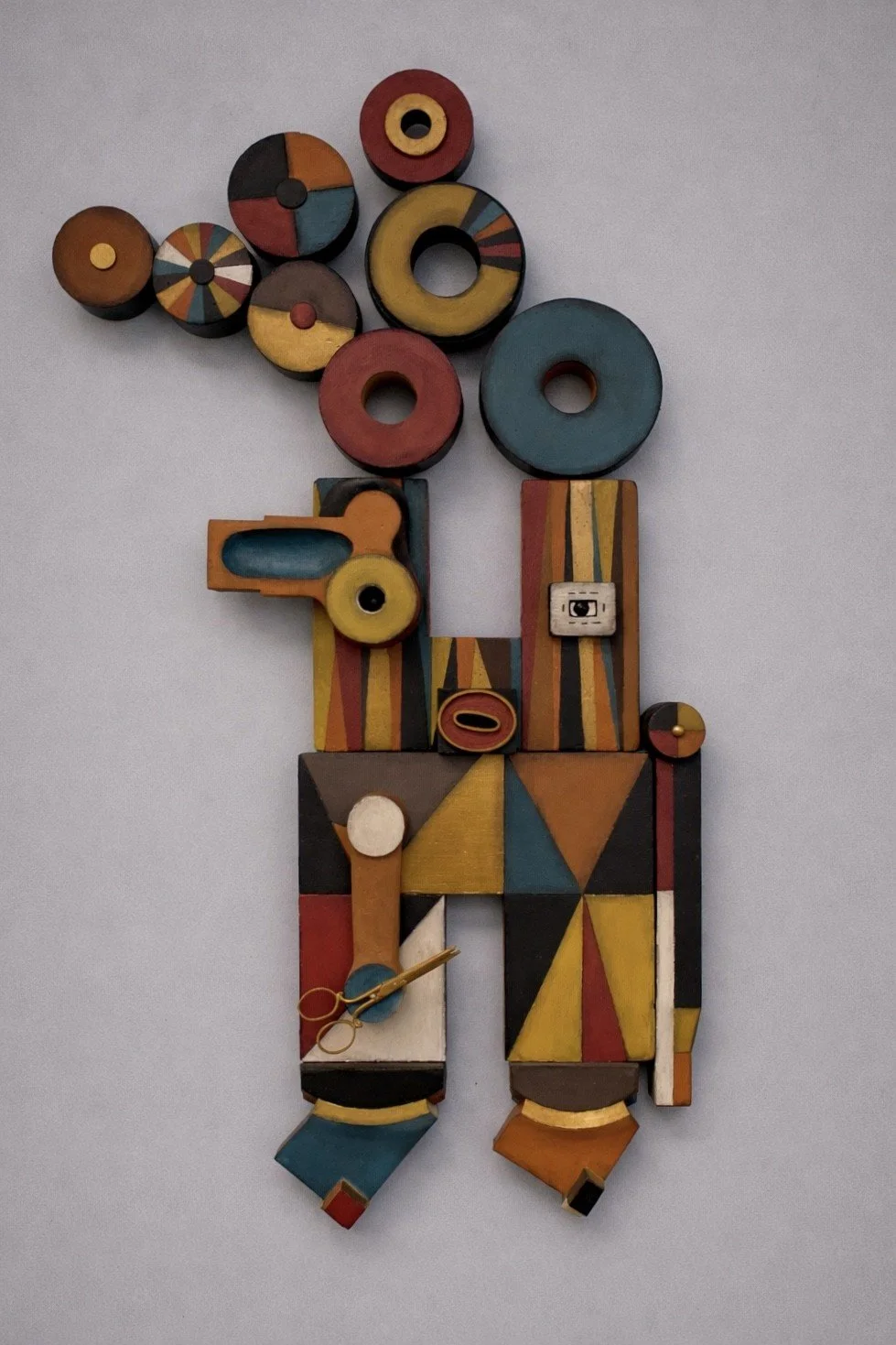 Running with Scissors, 29.5 x 17.5 x 3.5, painted foundry molds and found material, wall piece, 2022, $1600 