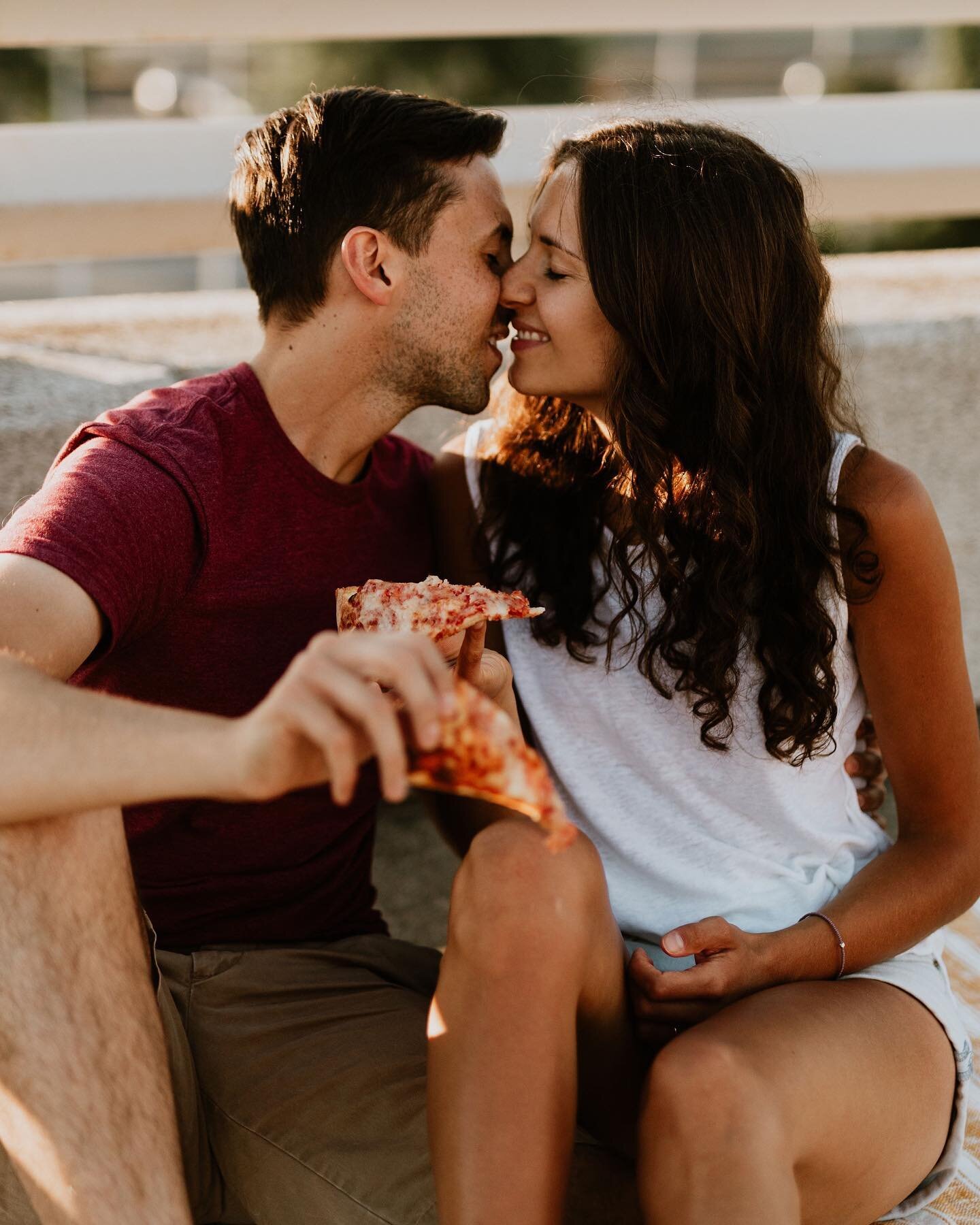 Cue the most adorable couple, pizza, and Champaign. What could be better?