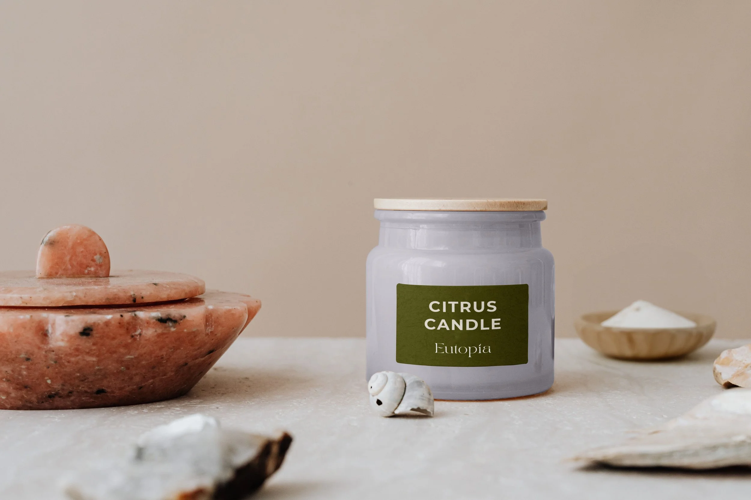 Branding mockups for Eutopía, highlighting Branding Kit and 1:1 Mentoring applied to handcrafted products for peaceful home living