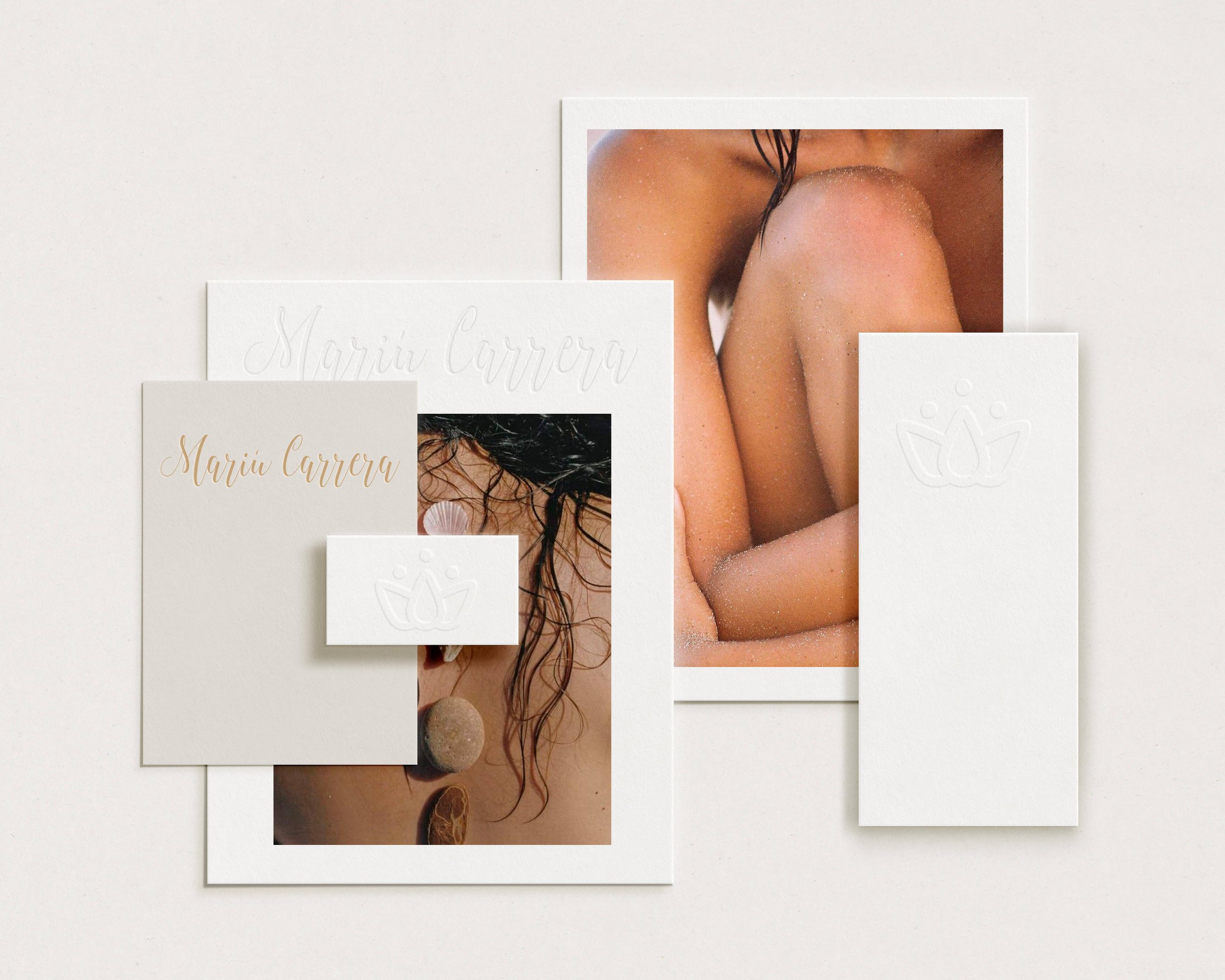 Curated brand stationery with photographic prints and embossed details.