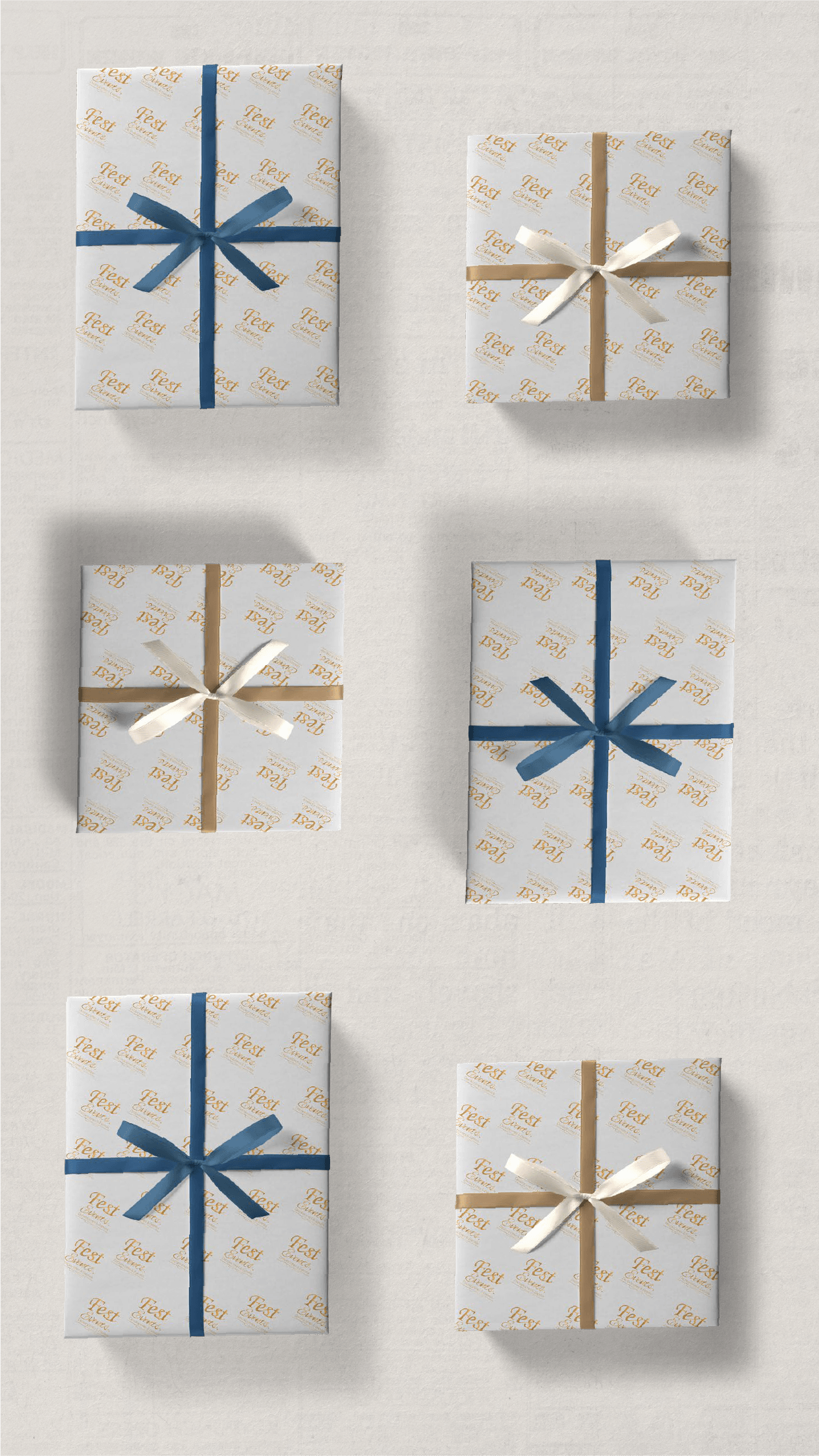 Collection of gift boxes wrapped in branded paper with silk ribbons.