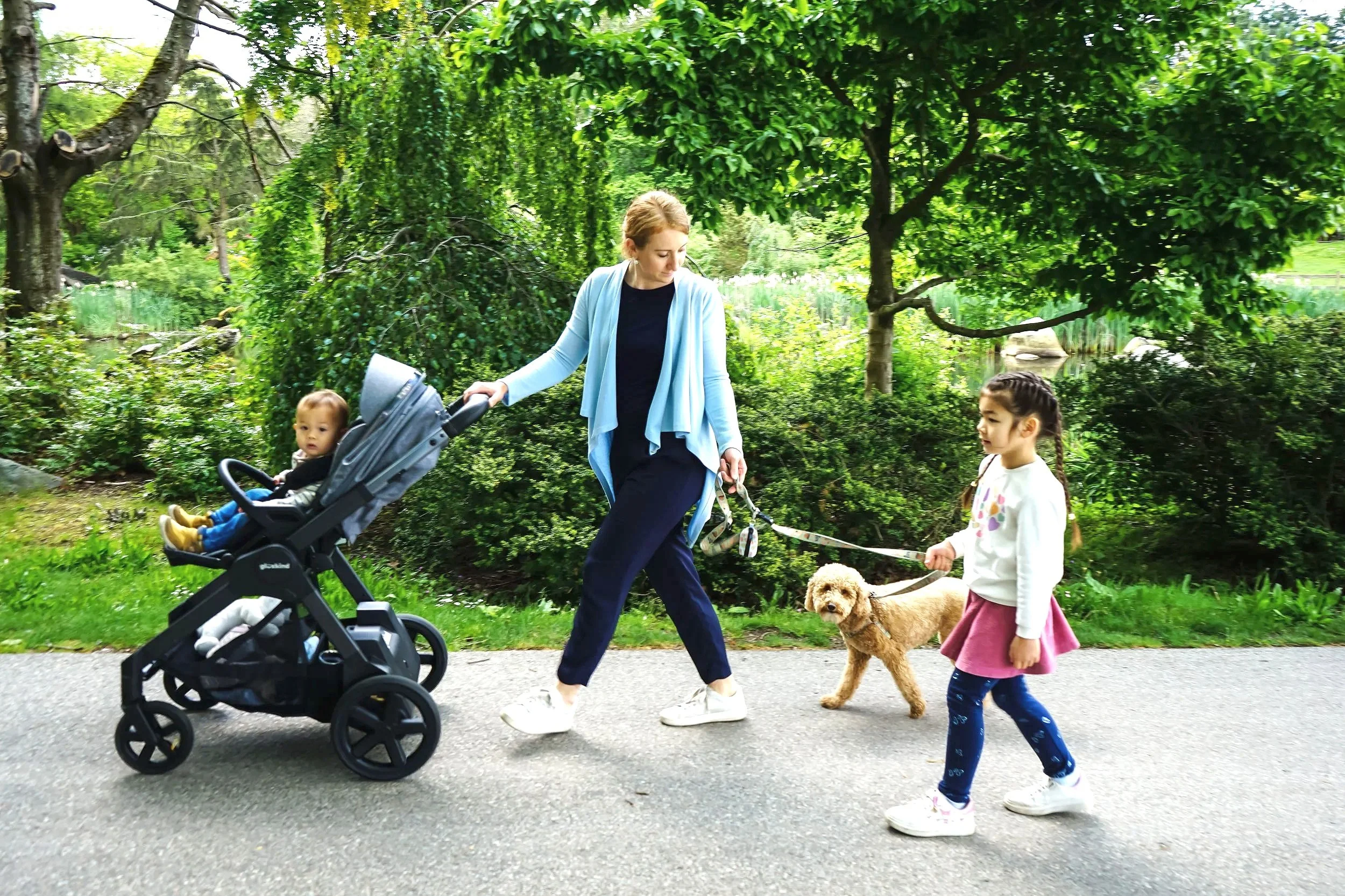 Gluxkind Family Walking in Park