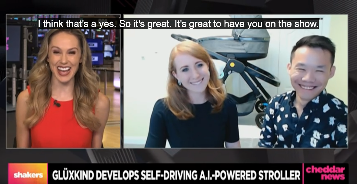 TV interview with three people discussing AI stroller development on Cheddar News.