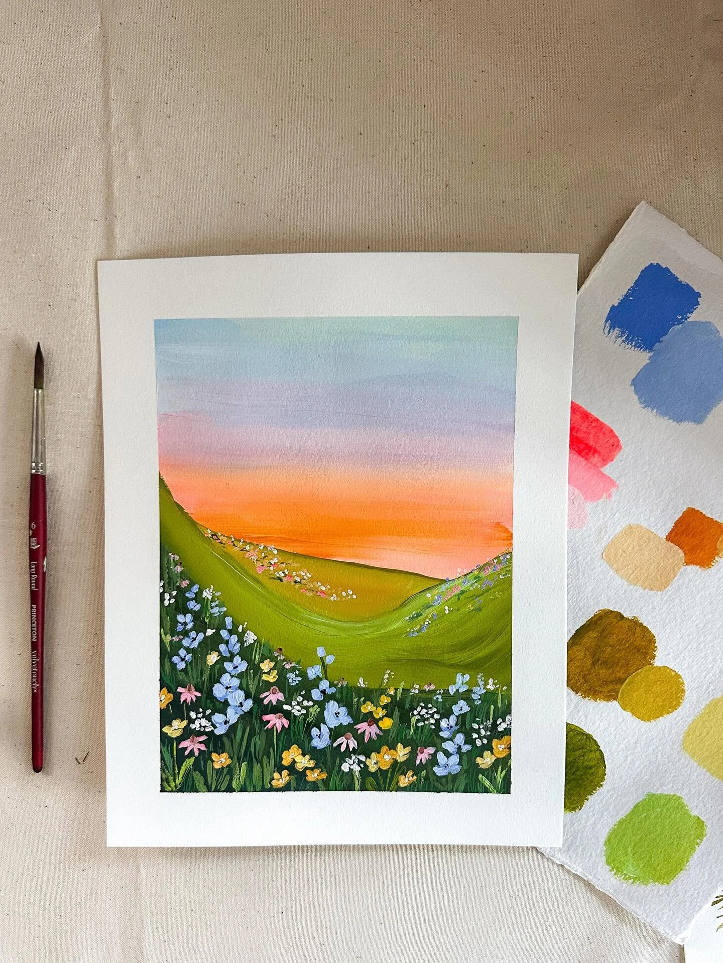 The study that is building into a collection. There&rsquo;s very large blank canvases lining the studio walls waiting to become a dreamy wildflower meadow like this.