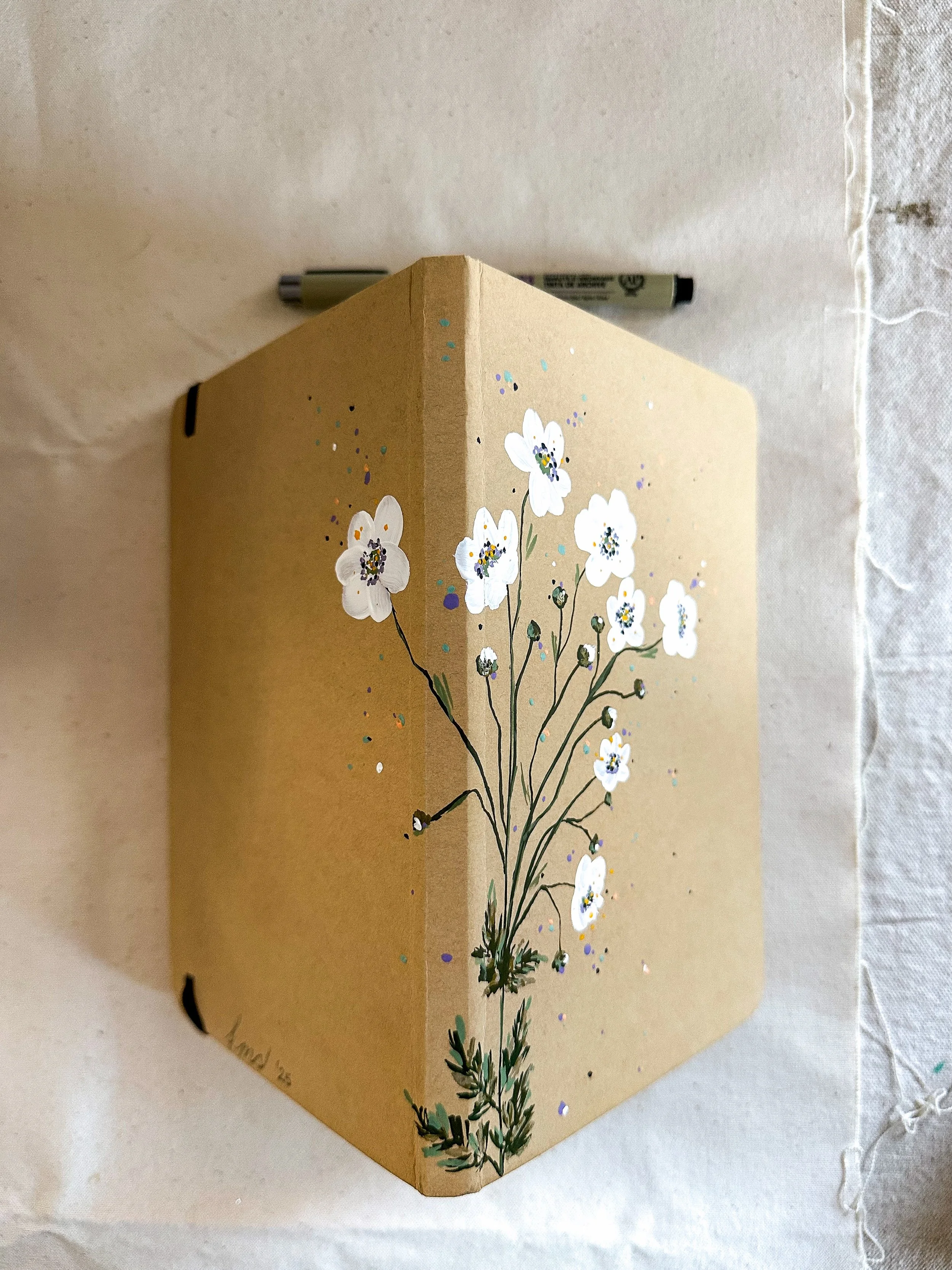 handpainted journal 5 side.jpeg