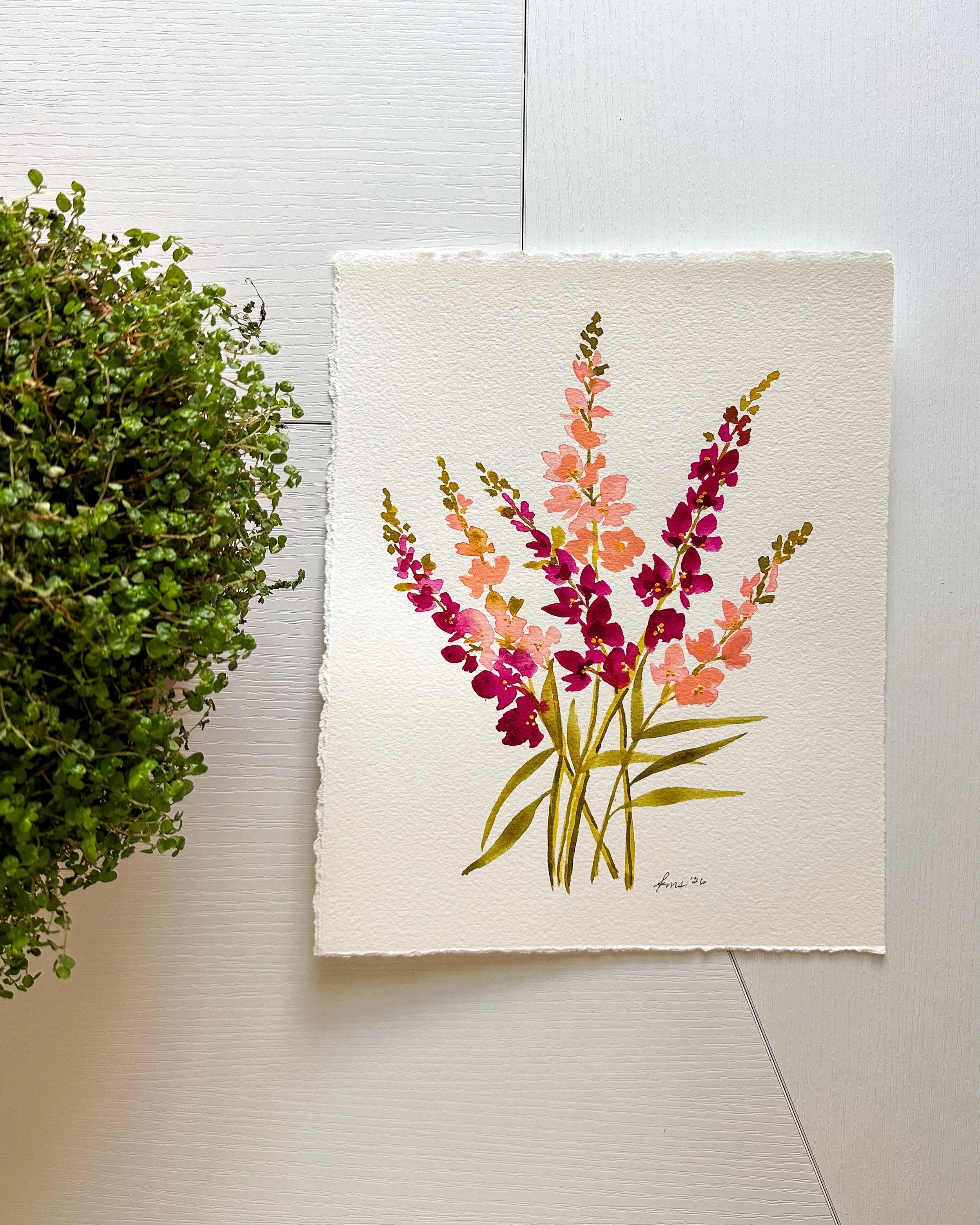 Snapdragon blooms on desk.jpeg