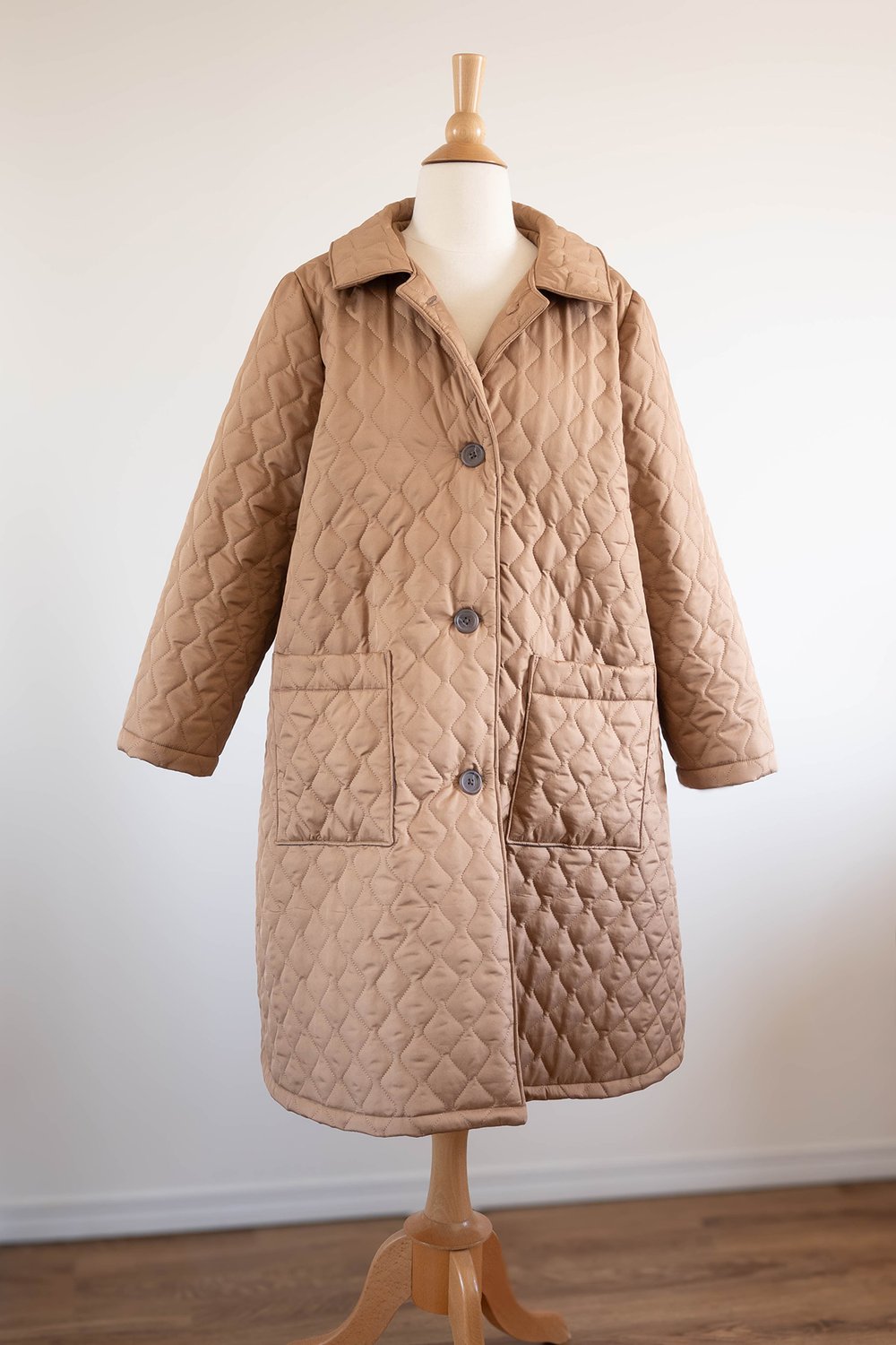 Biscuit coloured quilted coat