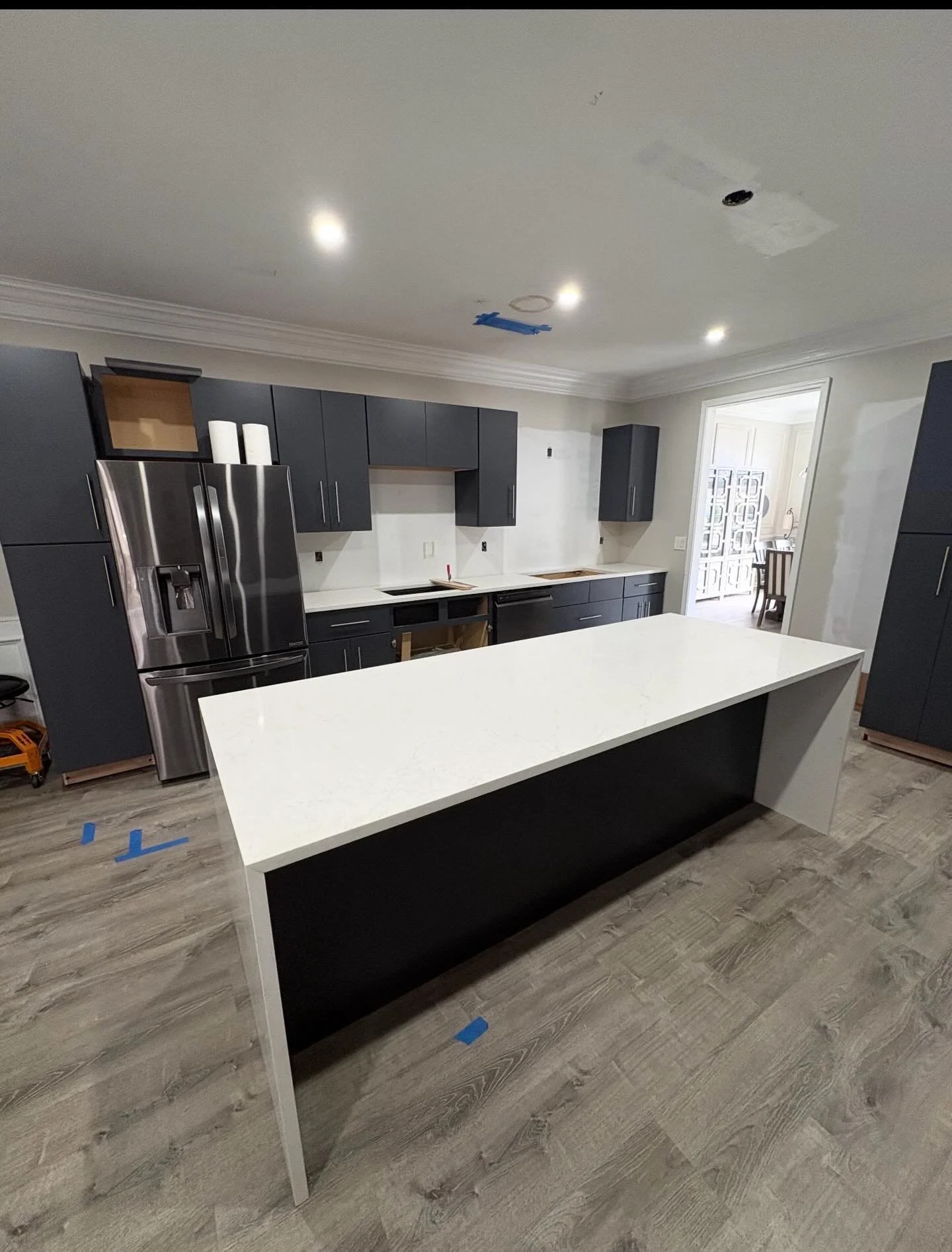 Another kitchen transformation completed in Lawrenceville, Georgia by PZ Countertops &amp; Customs.

This home now features bright white quartz countertops and a large waterfall island, creating a modern centerpiece that completely elevates the space