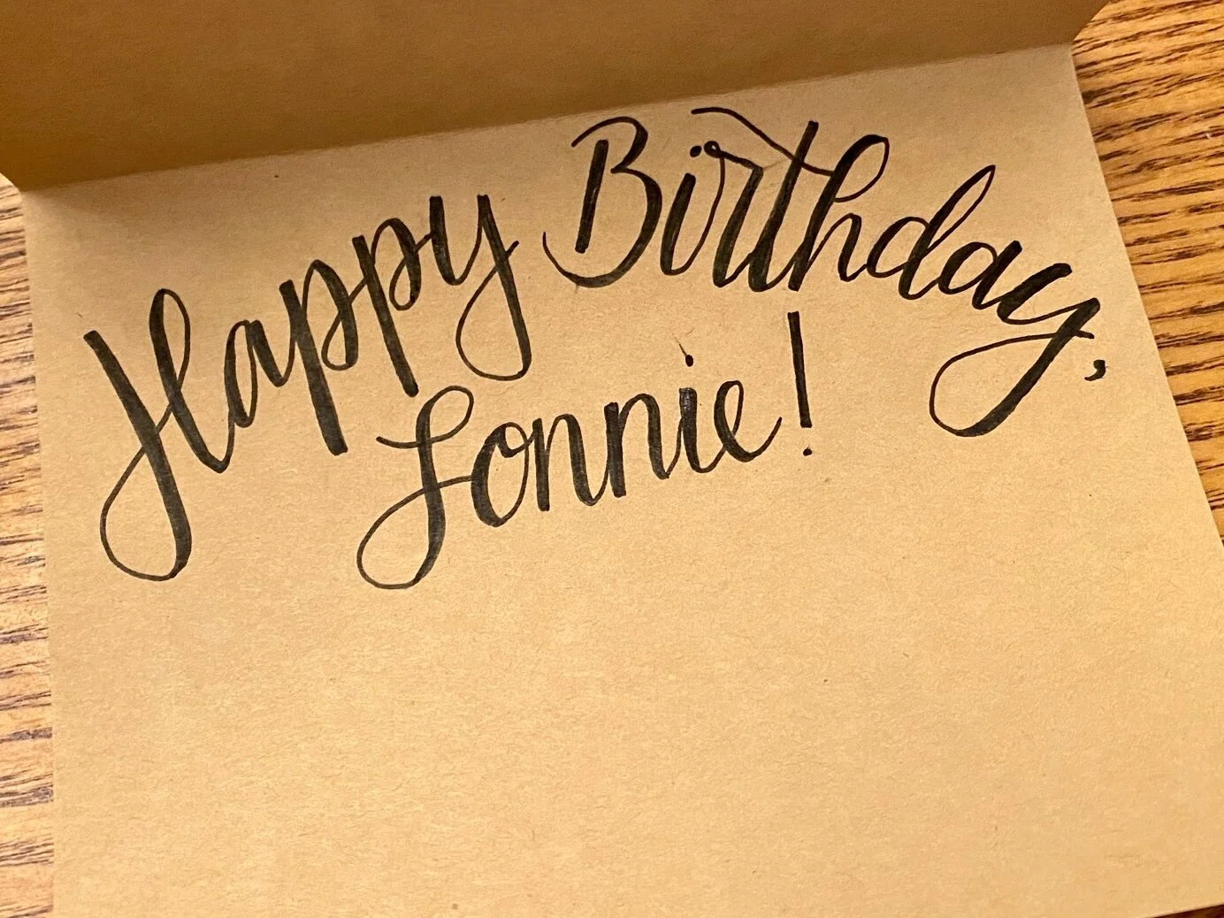 A custom birthday card featuring hand lettering